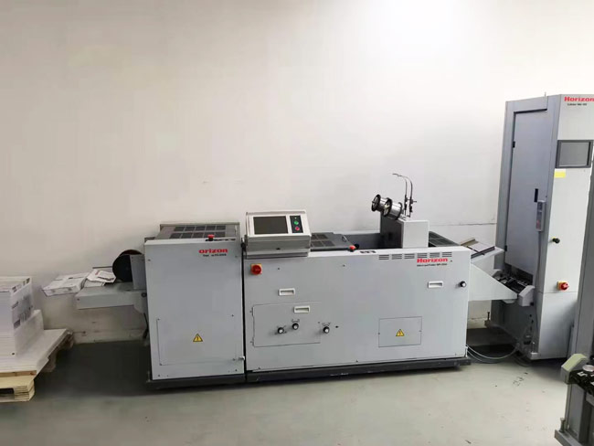 欧洲进口好利用吸风配订折切骑马联动线