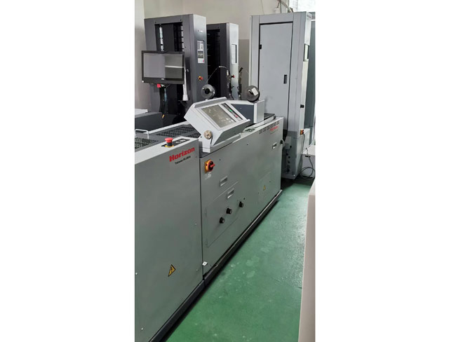 欧洲进口好利用吸风配订折切骑马联动线